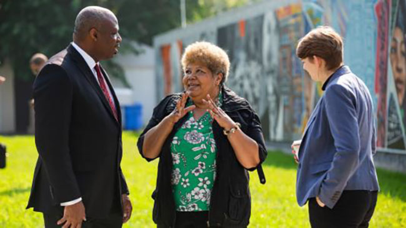 Paula Robinson, president of Bronzeville Partners, center, speaks with Henry McKoy, left, SCEP director, and Ruby Goldberg, with DOE’s Office of Congressional and Intergovernmental Affairs.