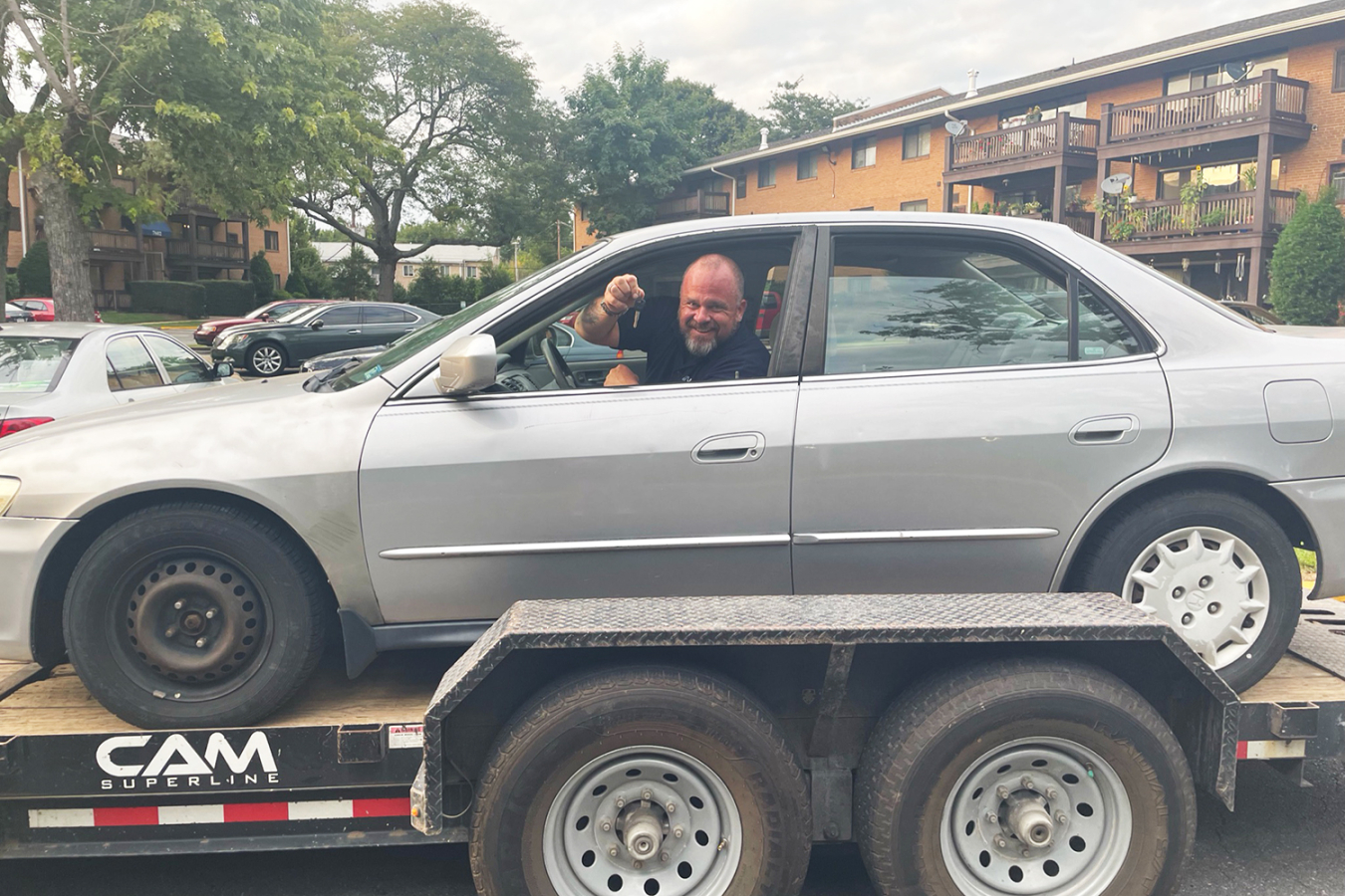 A car on a trailer.