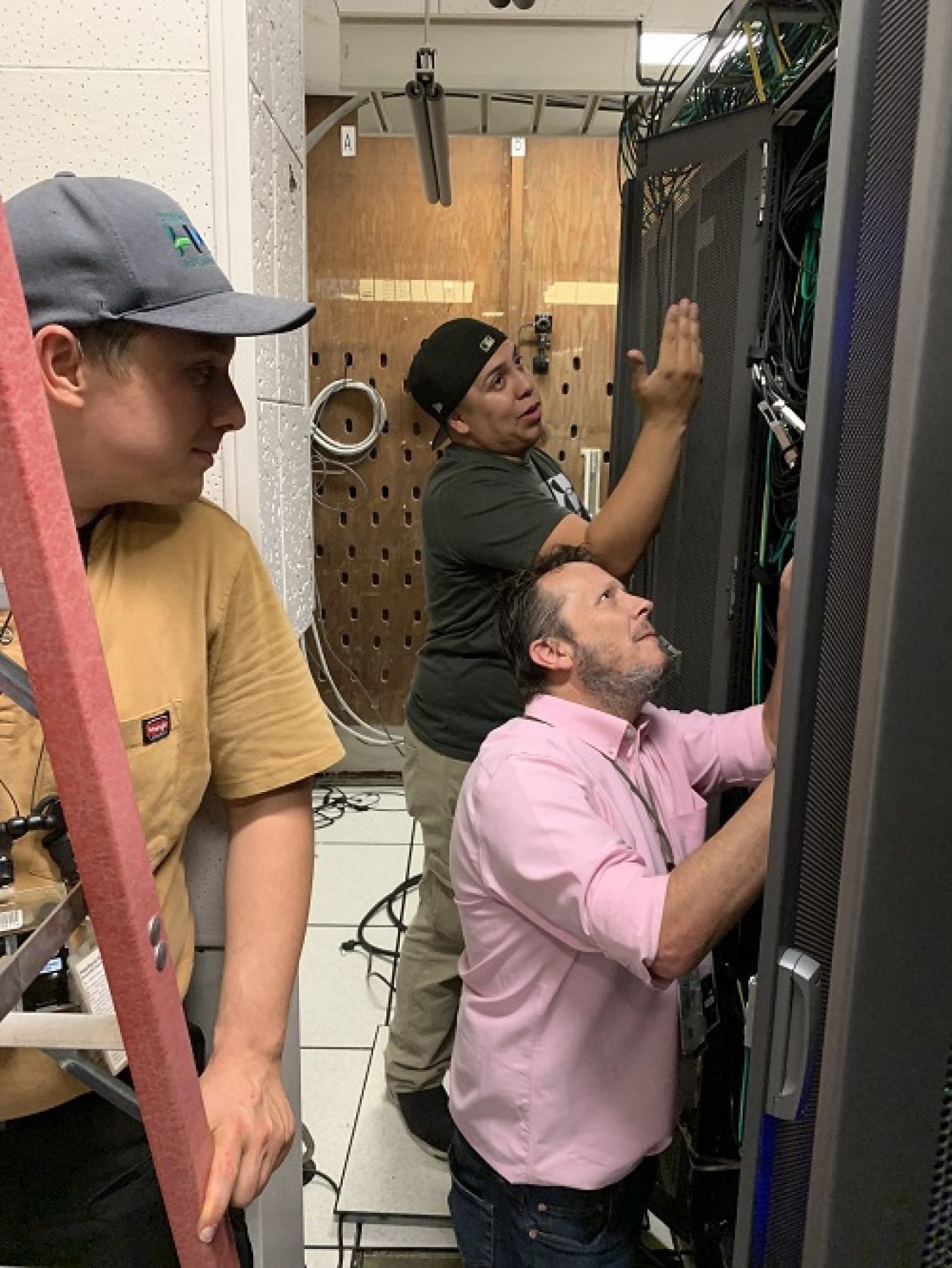 Two technicians participate in an exercise at a data center on the Hanford Site.