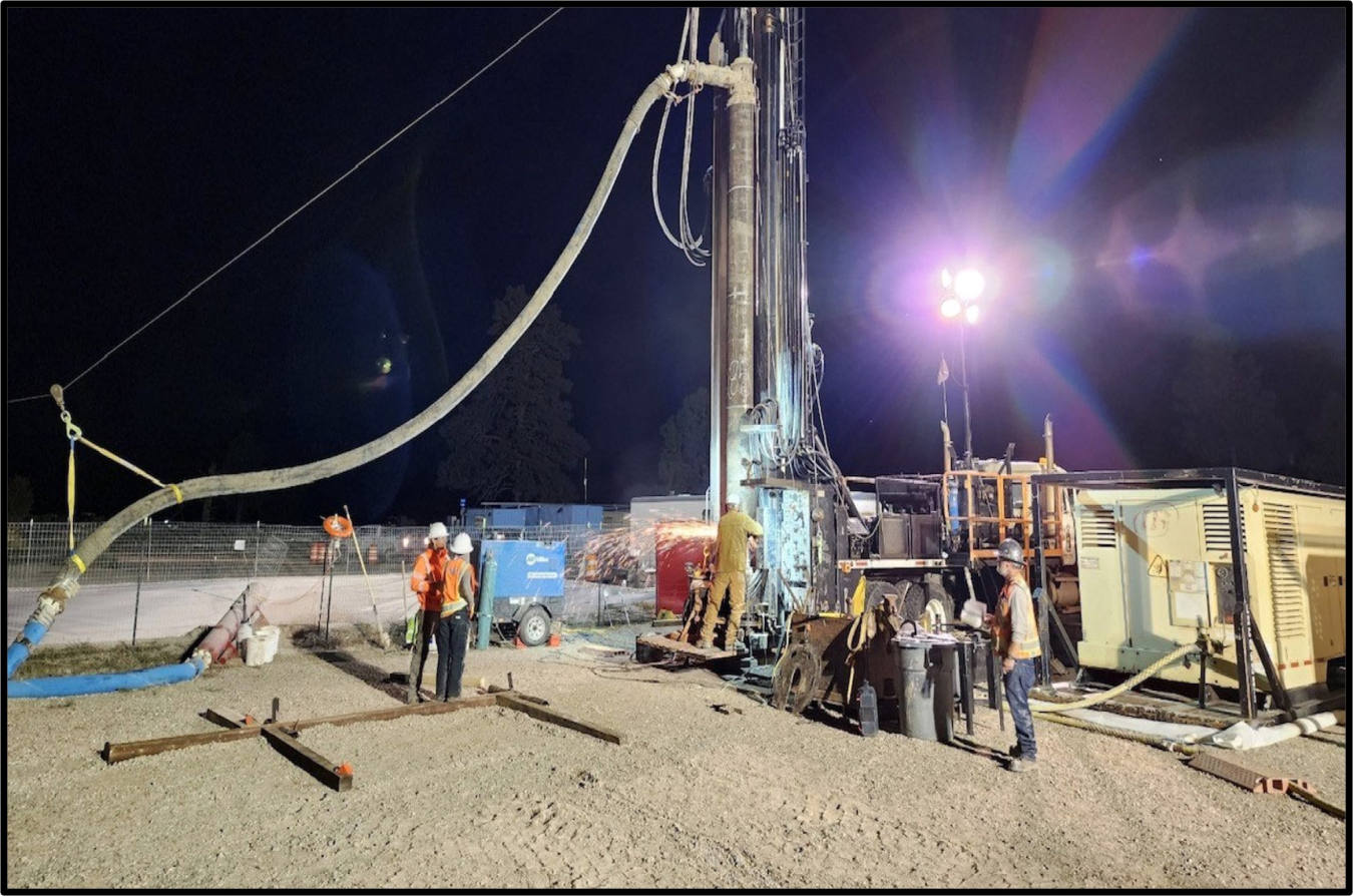Large drilling well going into the ground