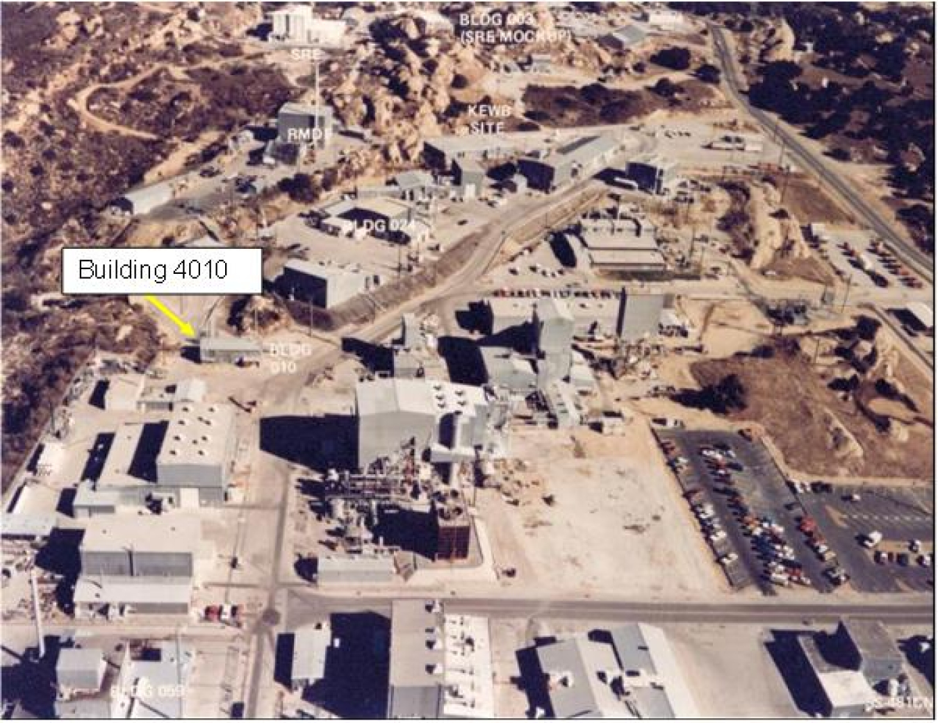 Building 4010 is indicated by the yellow arrow in this aerial view.