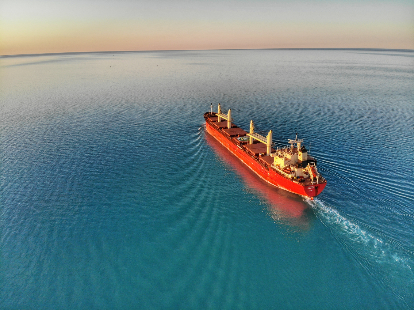 shipping boat on blue water