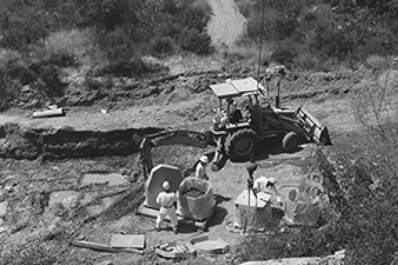 Workers excavating the RMHF Leach field in July, 1978.