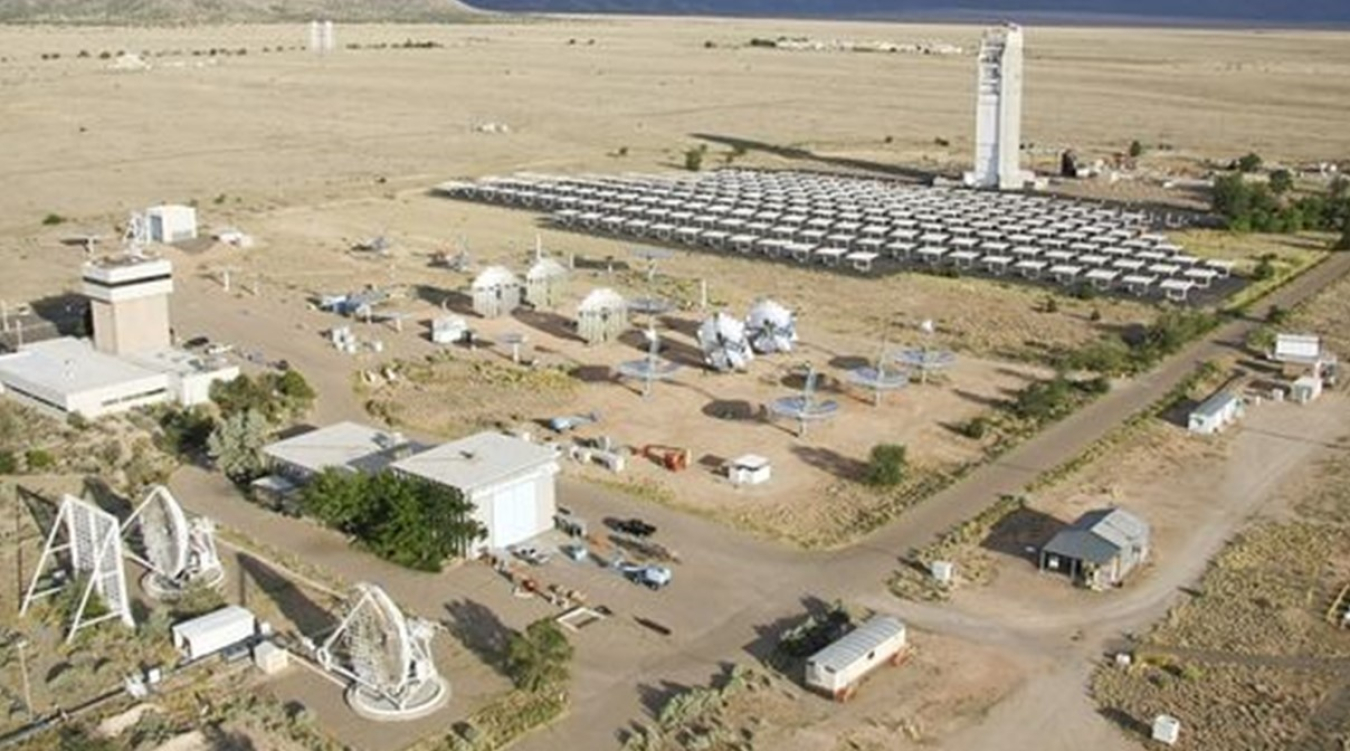Aerial view of a tower and various equipment.