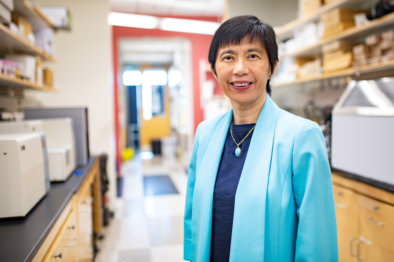 Photo of a person in a research lab