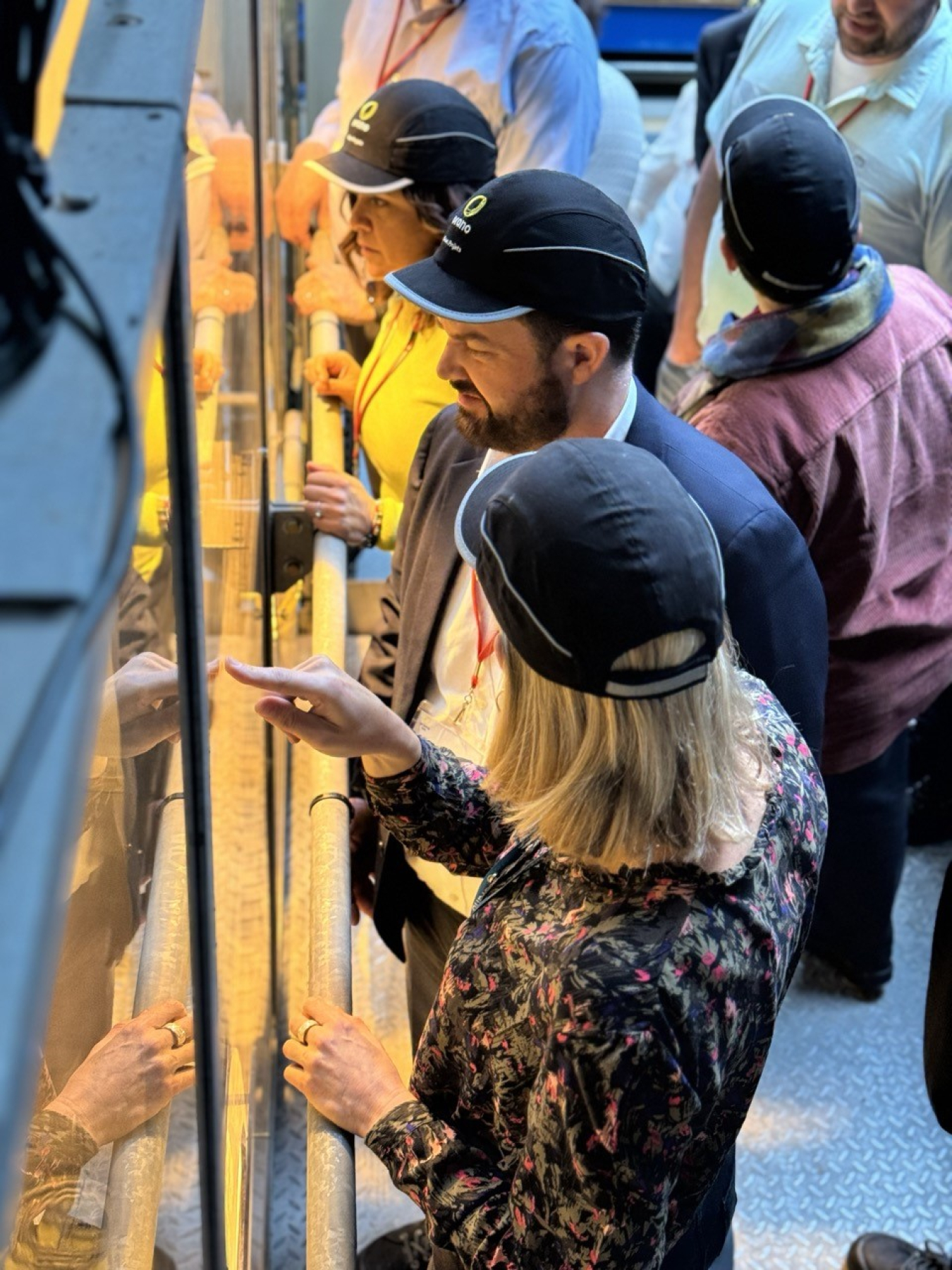 EM Leader looking at an exhibit at a French research hall