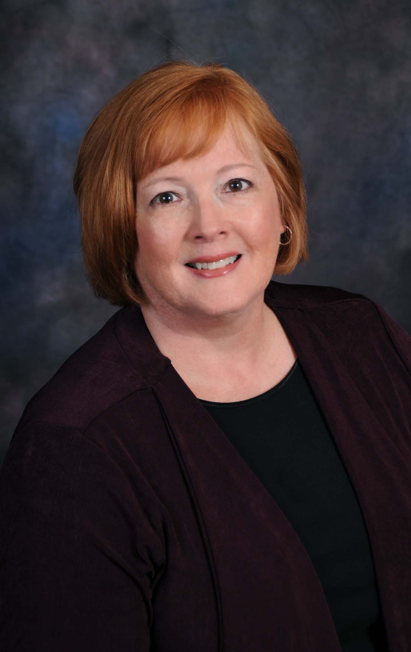 A headshot of Jolene Sheil