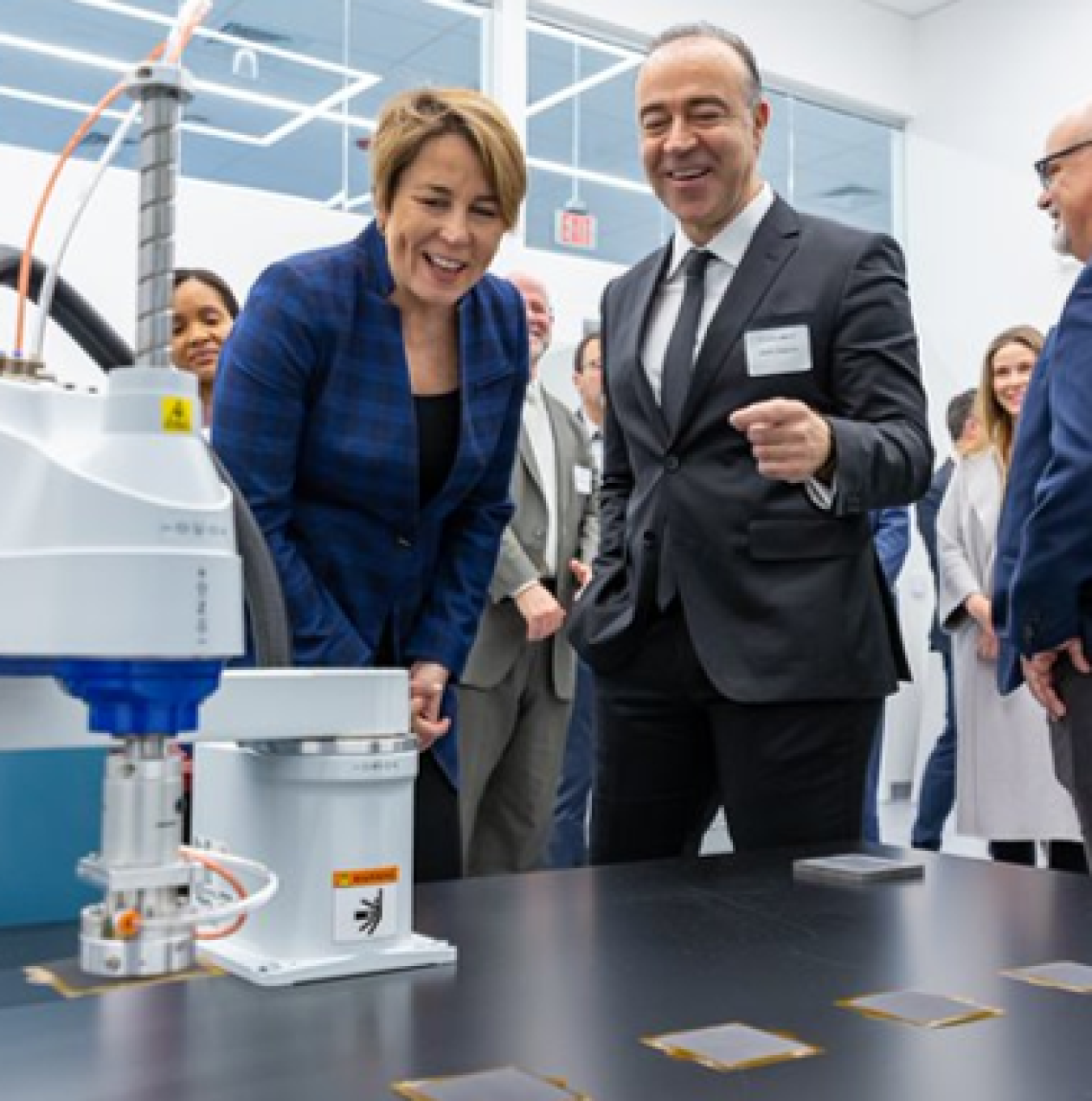 Advent Chairman and CEO Vasilis Gregoriou and Massachusetts Governor Maura Healey tour a lab in Advent’s new manufacturing and R&D facility.