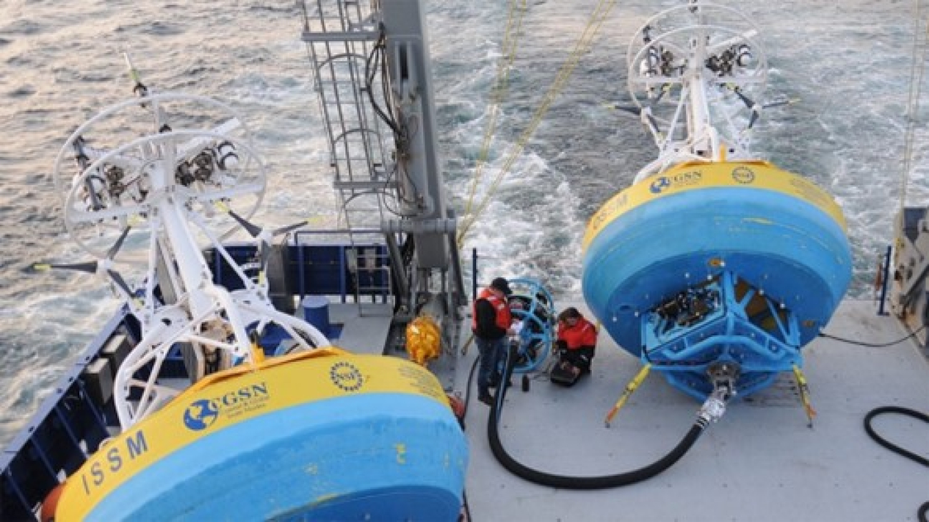 A photo of two large buoys onboard a ship.
