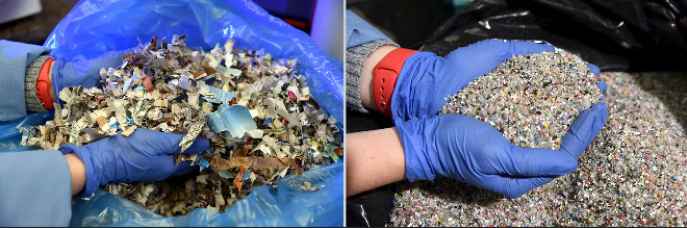 gloved hands showing ground-up waste