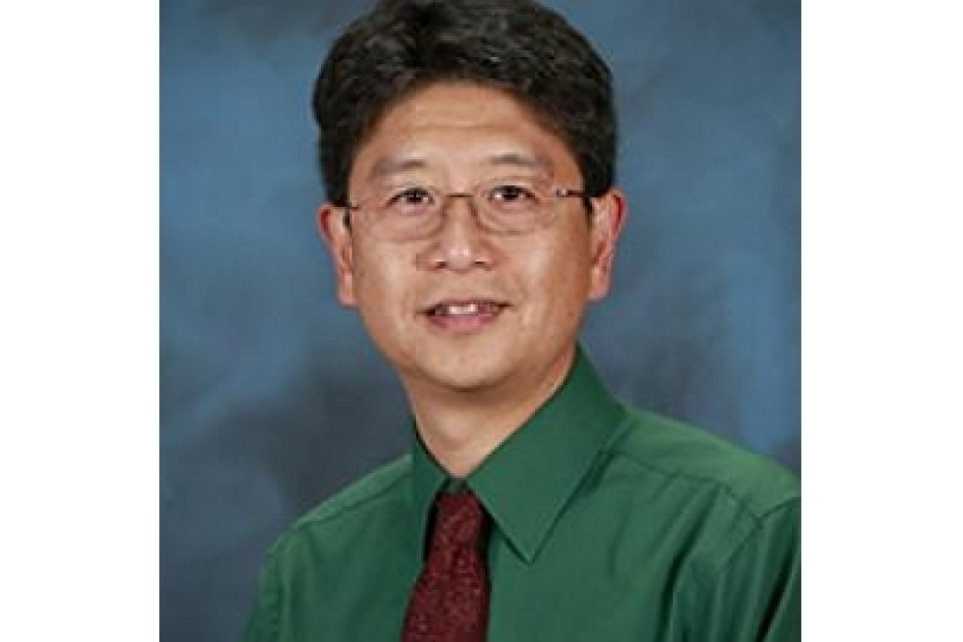 Jun Qu headshot