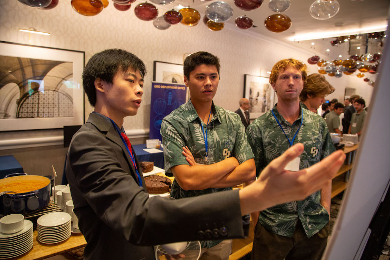 Students Participating in the Collegiate Competitions look at a schedule during Water Power Week 2023