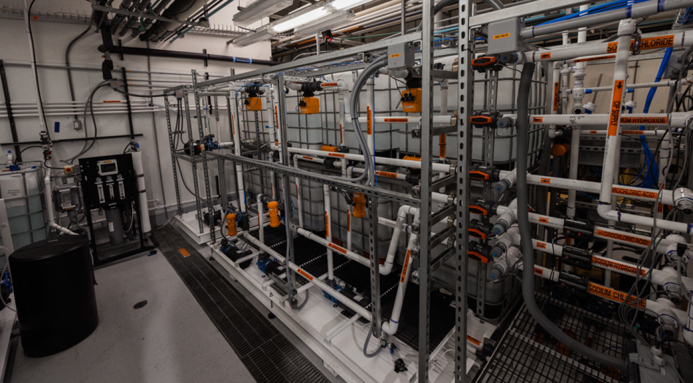 An industrial-looking room filled with interconnected pipes.