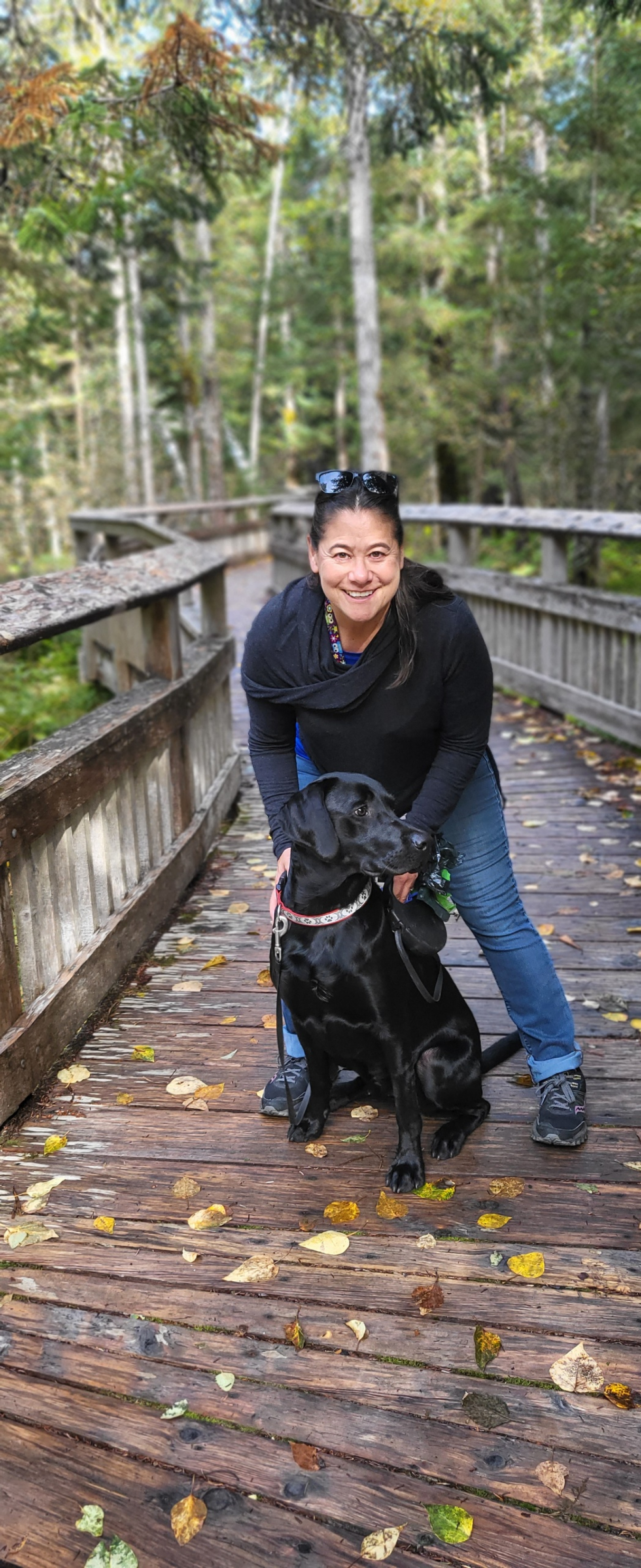 Annette Hard and her dog Finn at the Boardwalk in Portage, Alaska.