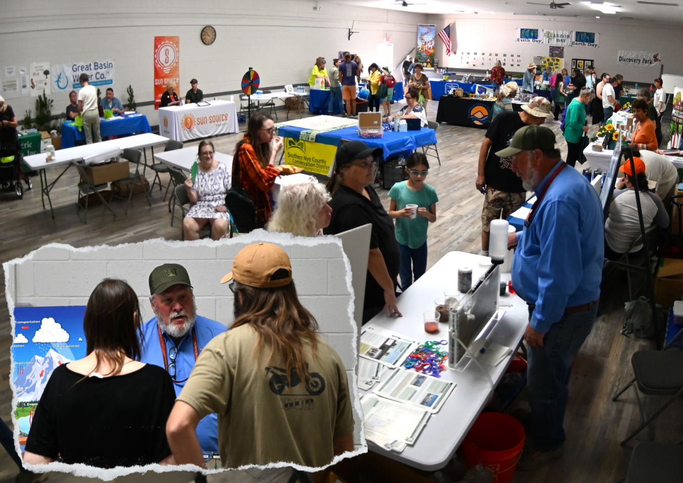 An overhead view of a room with lots of people and information booths, a smaller picture is in the bottom left corner with an up close shot of 2 people at a booth talking to an employee