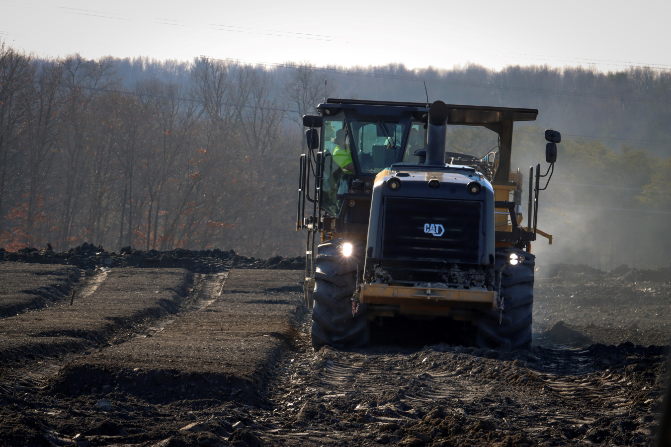 A large heavy equipment vehicle driving