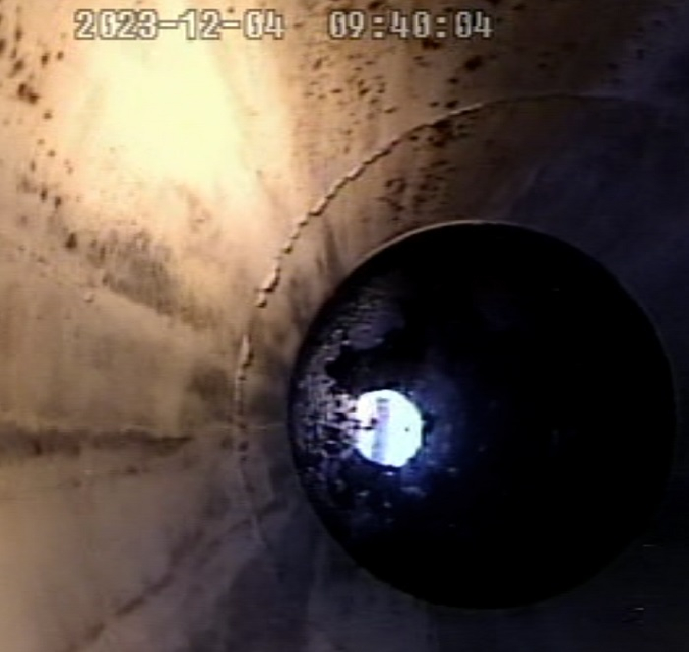 The inside of a waste take riser