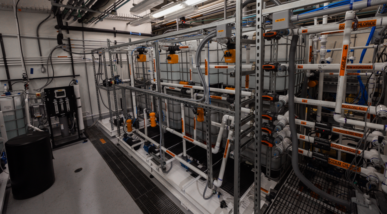 An industrial-looking room filled with interconnected pipes.