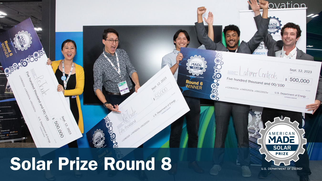 Grand Prize Winners from round 6 celebrate with their giant checks