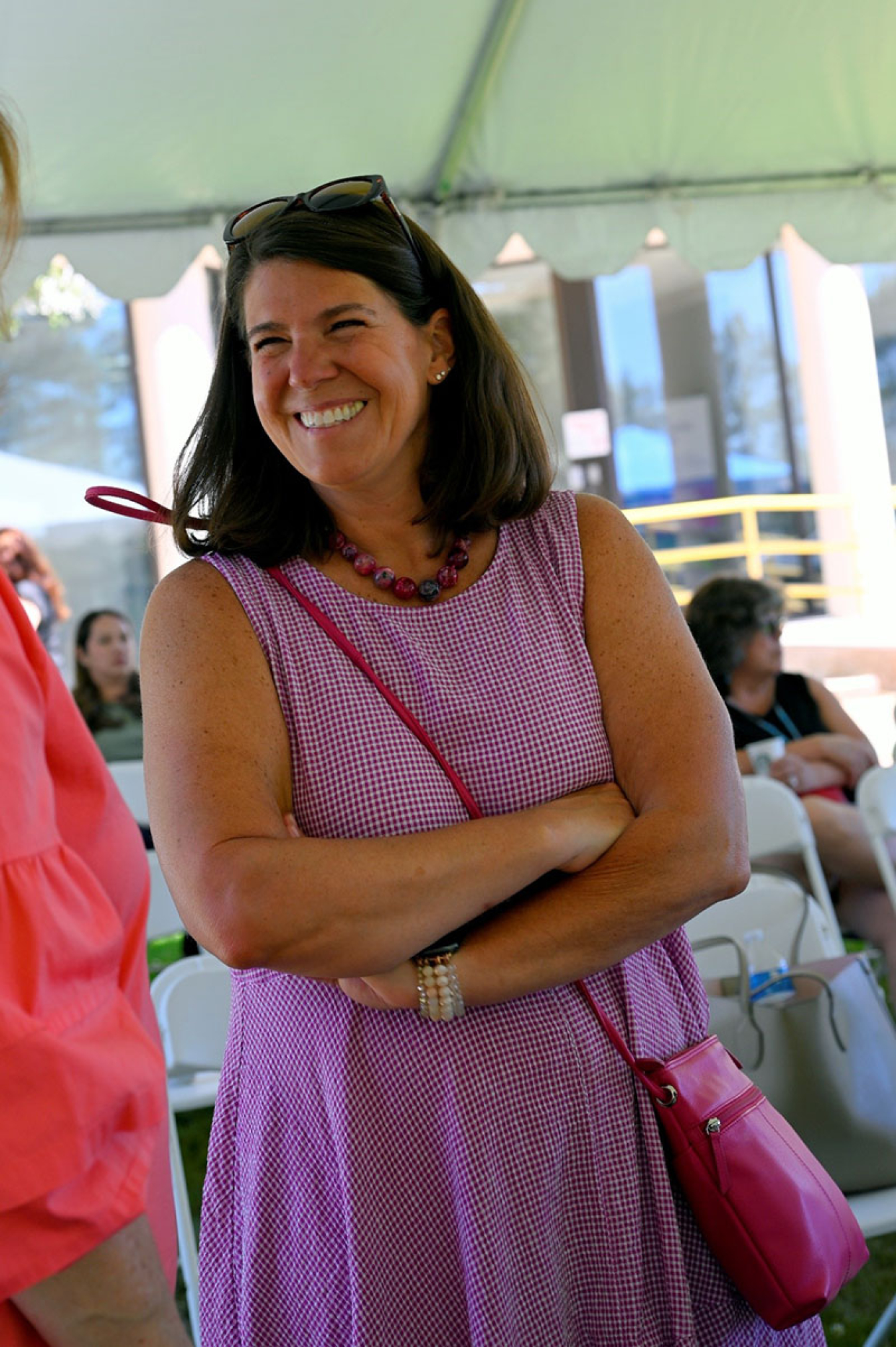 Sara Pasqualoni MD MPH, LANL Site Occupational Medical Director, Division Leader Occupational Health laughs while mingling after the conclusion of presentations.