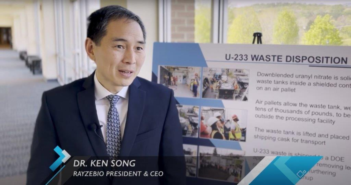A screen capture from an interview of a man in a suit 