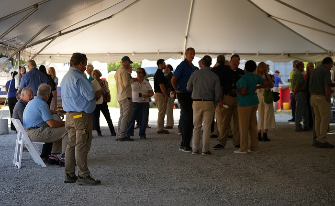 People participate in a guided tour and information session.