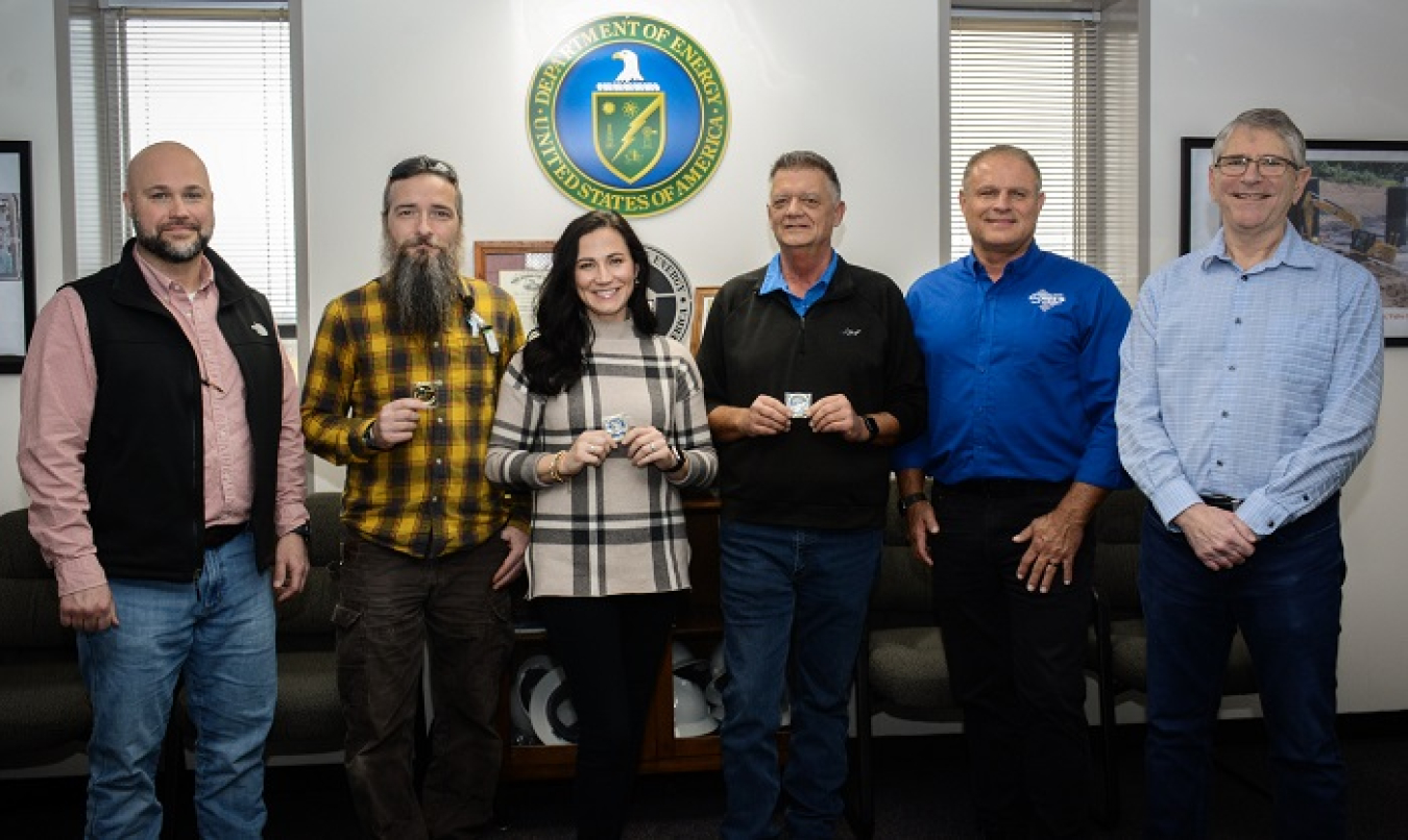 Workers recognized for their efforts in safely and conscientiously characterizing enrichment equipment in X-333.