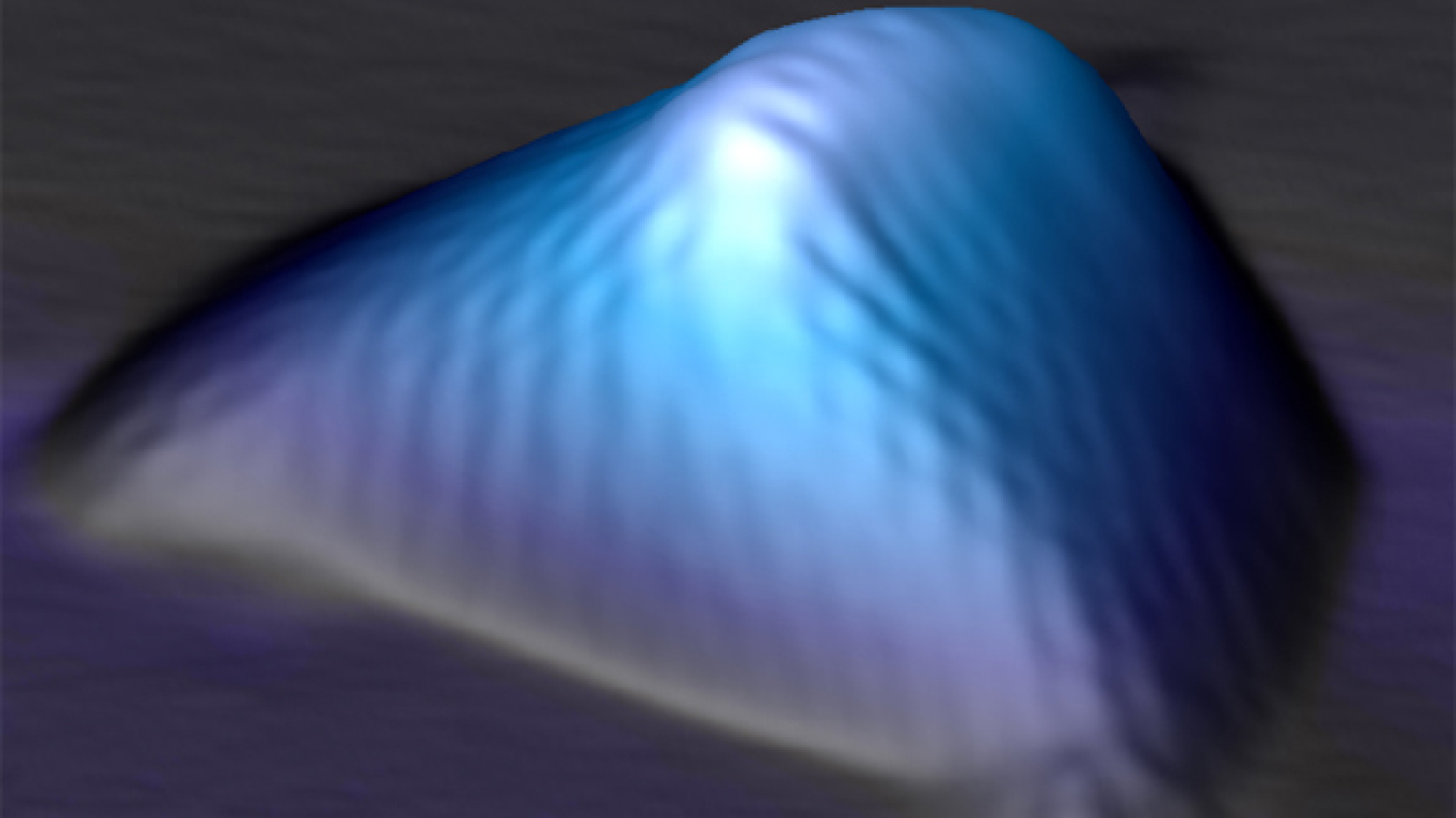 In this scanning tunneling microscopy image of a graphene nanobubble, the grapheme crystal is distorted and stretched along three main axes. The strain creates pseudo-magnetic fields far stronger than any magnetic field ever produced in the laboratory.