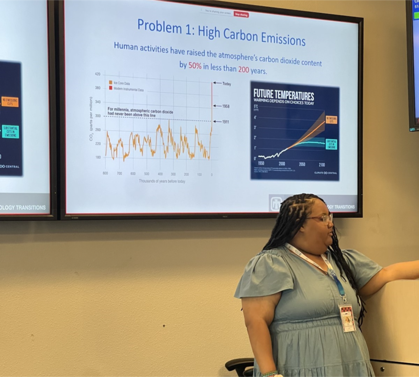 OTT-Sandia Laboratory intern, Julie Ware, presenting her final presentation to a panel of reviewers and an audience of DOE and laboratory staff.