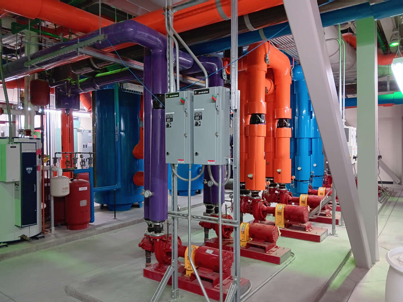 Colorful pipes in an industrial building.