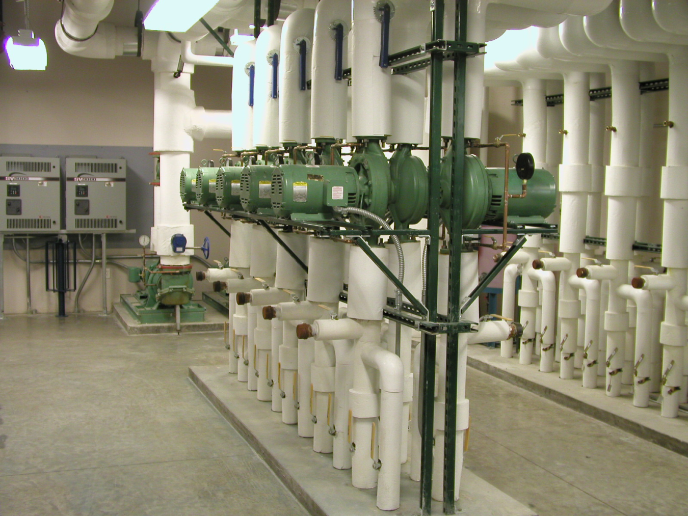 Heat pumps in the Century Center in Bismarck, North Dakota, keep state employees comfortable in the offices above as air circulates reliably, silently, and out of sight in pipes below. 