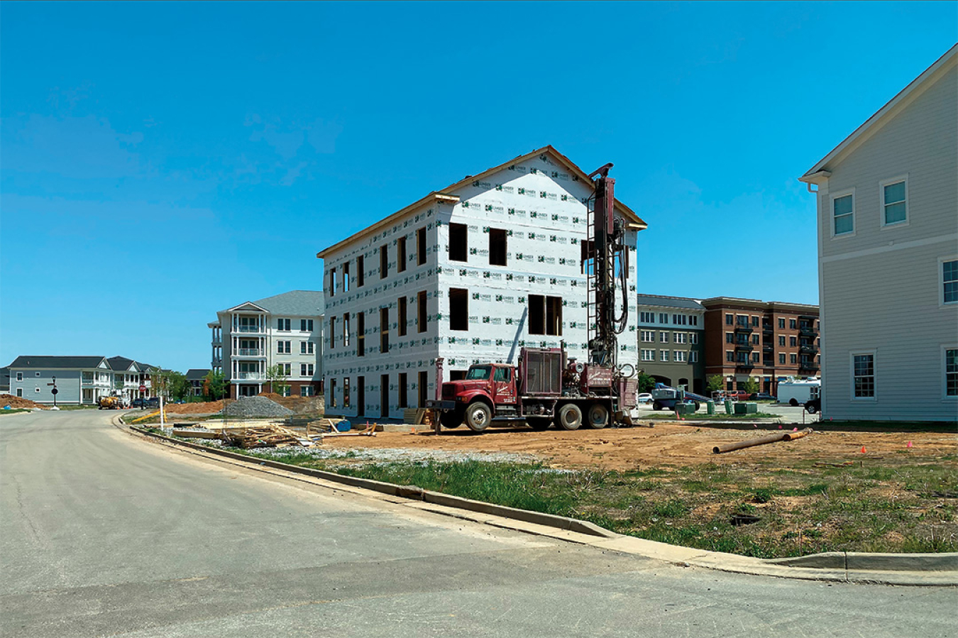 Geothermal heat pump drilling at a new housing development in Norton Commons, North Village, Kentucky.