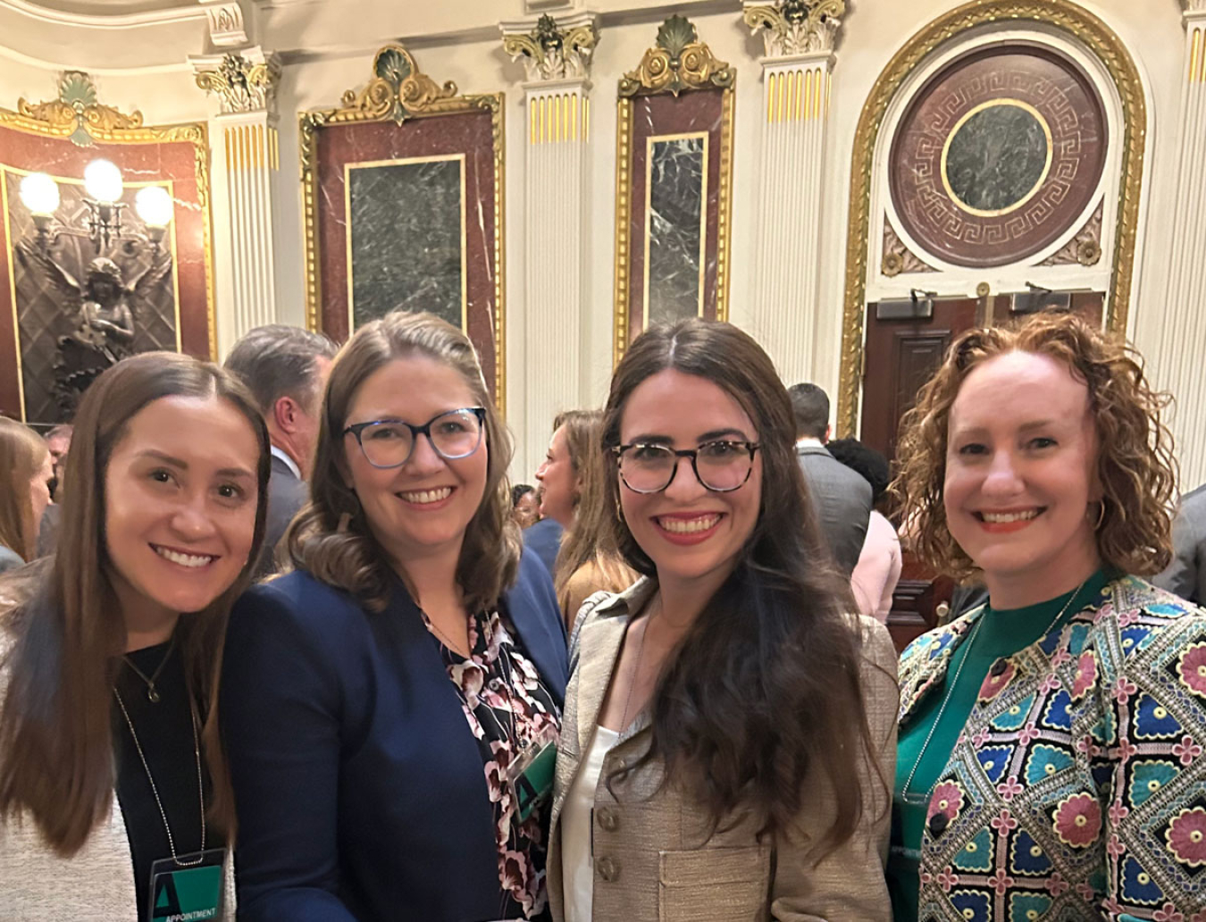 4 women in an ornate White House room for a gathering.