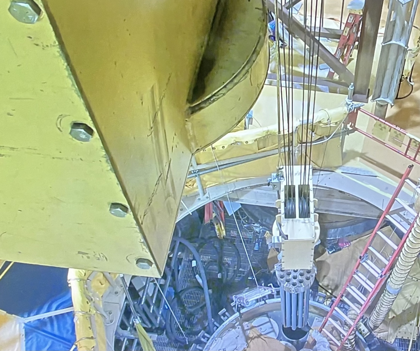 An up close view looking down on a drilling machine