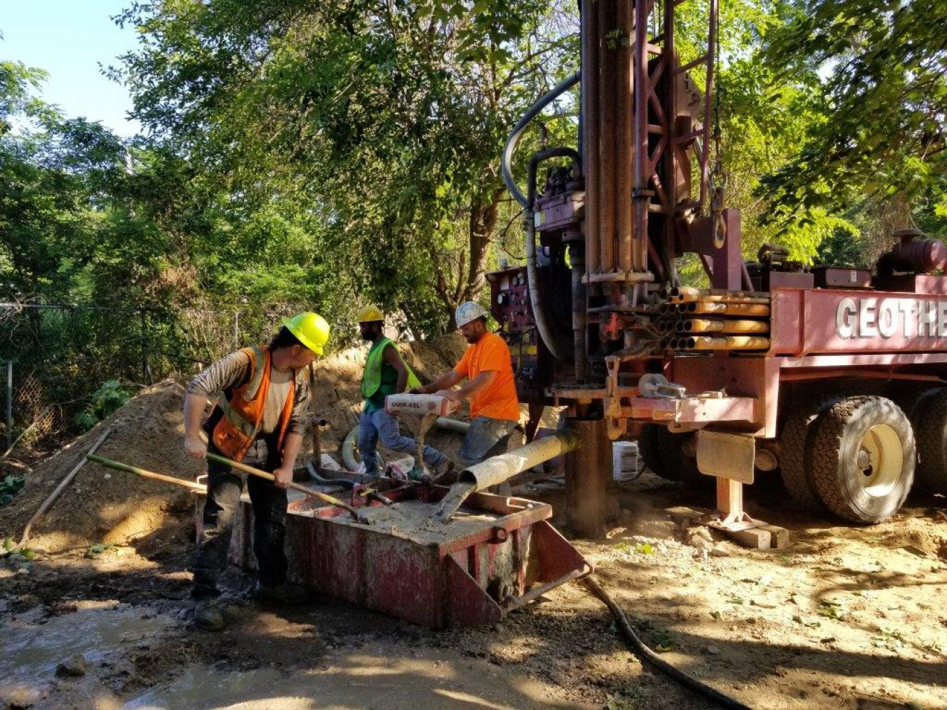 A photo of a construction crew working on the Medford home site.