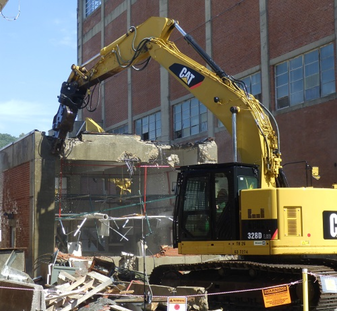 Demolition began on the Carpentry Shop in the Alpha-2 complex in Oak Ridge.