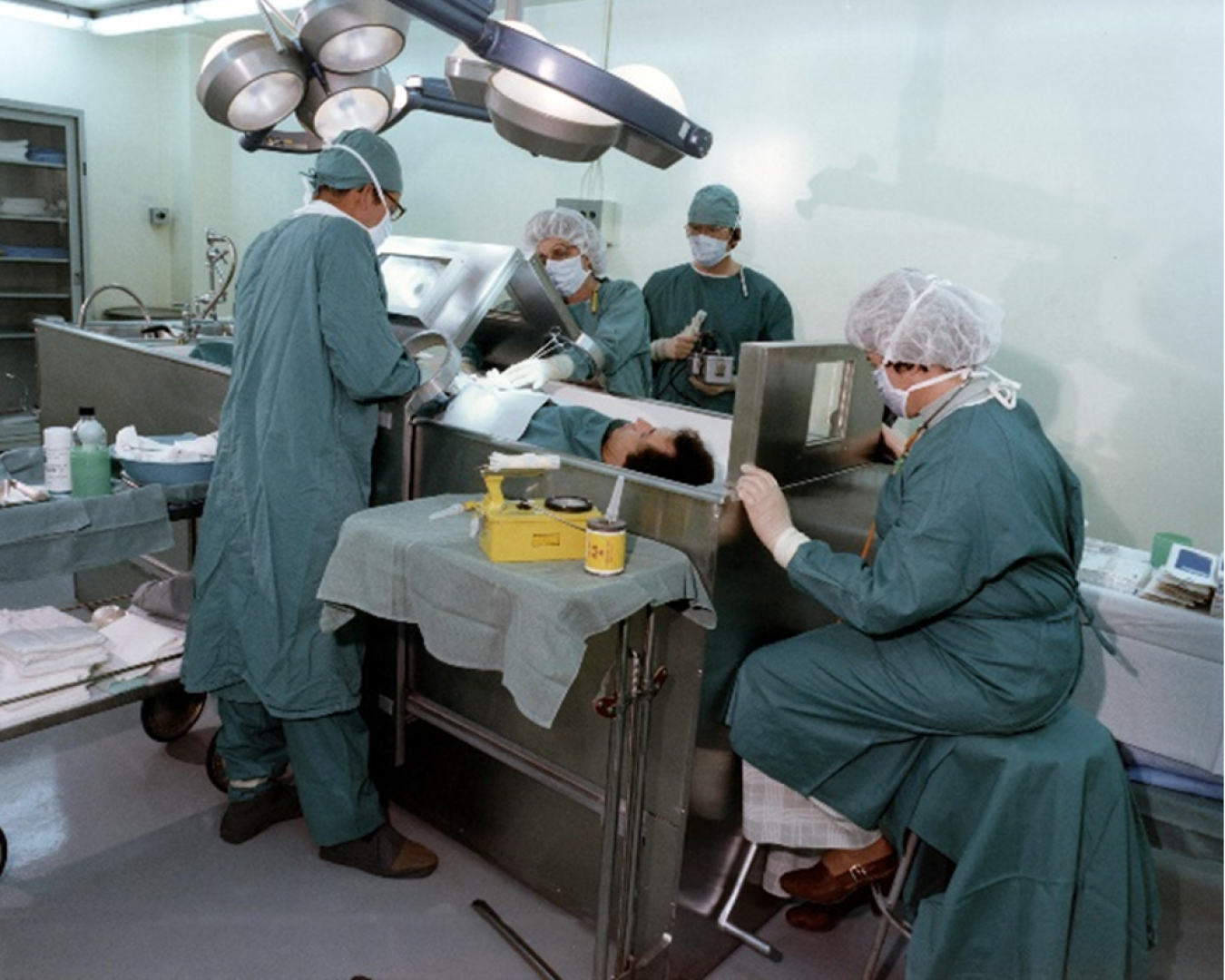 The medical staff at DOE’S REAC/TS demonstrate operation with embedded radioactive material requiring shielding.