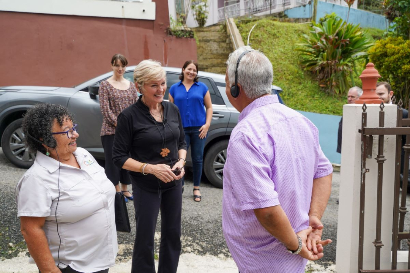 Secretary Granholm arrives at the home in Jayuya alongside representatives of the Cooperativa Hidroeléctrica de la Montaña to discuss the homeowners’ eligibility for the Programa Accesso Solar back in February 2024.