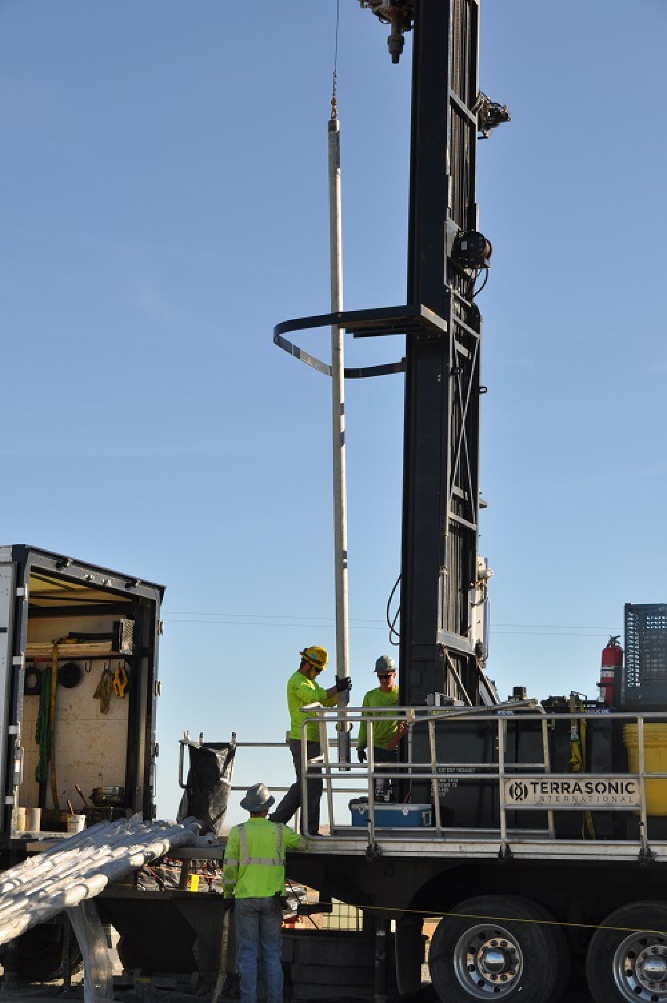 Workers drilling on a large groundwater well