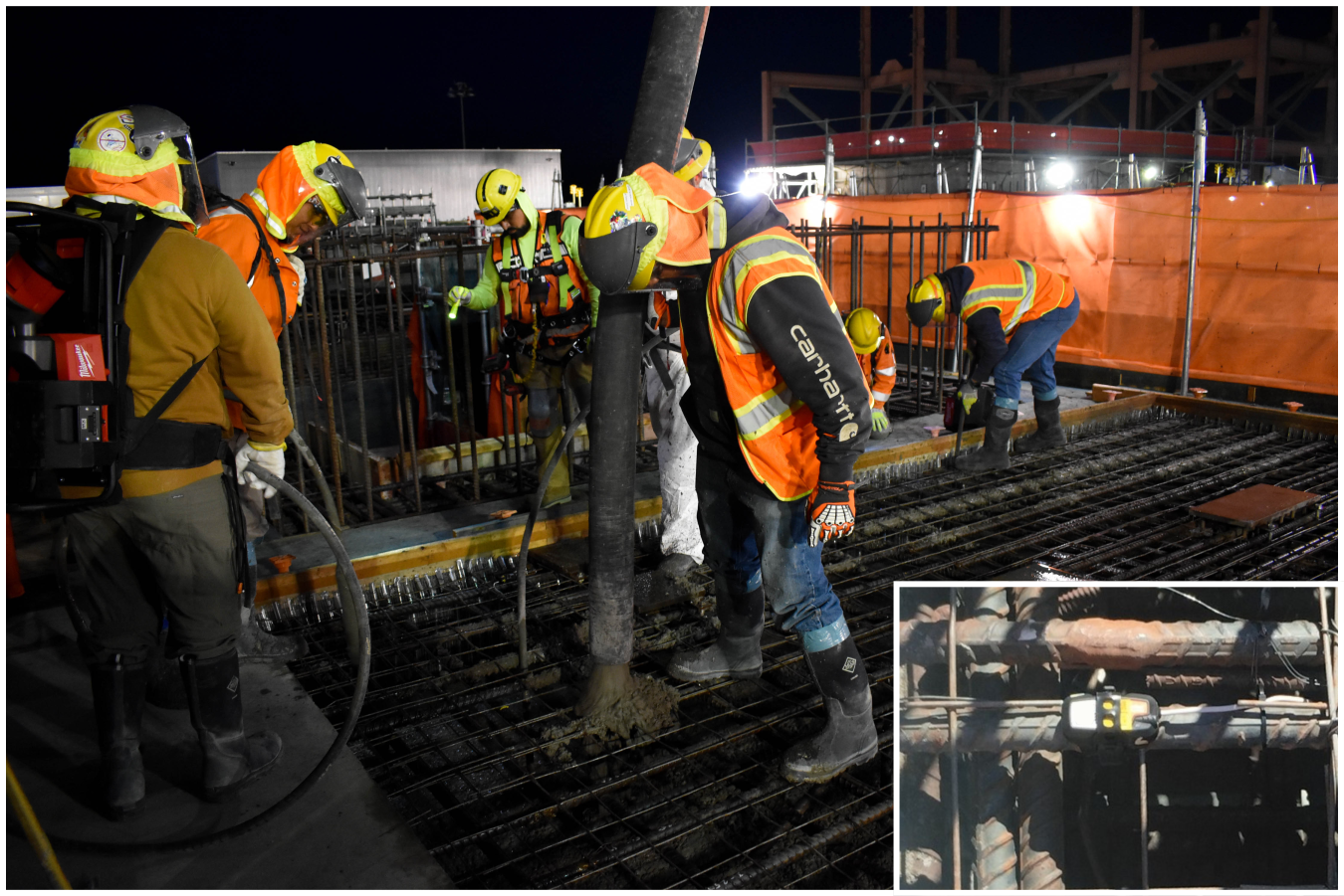 A group of workers in safety gear works on placing concrete