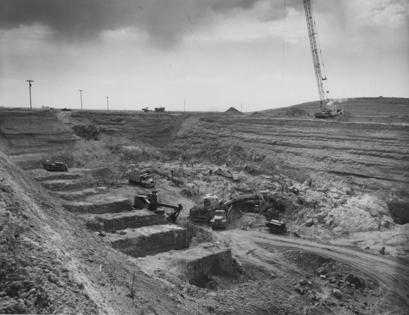 A black and white photo of a construction site