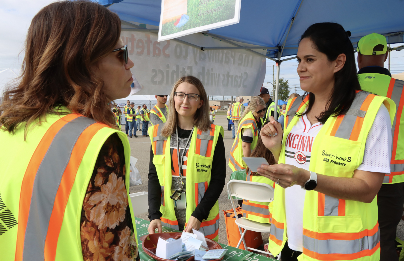 A person participates in a quiz during the Health and Safety Fair.