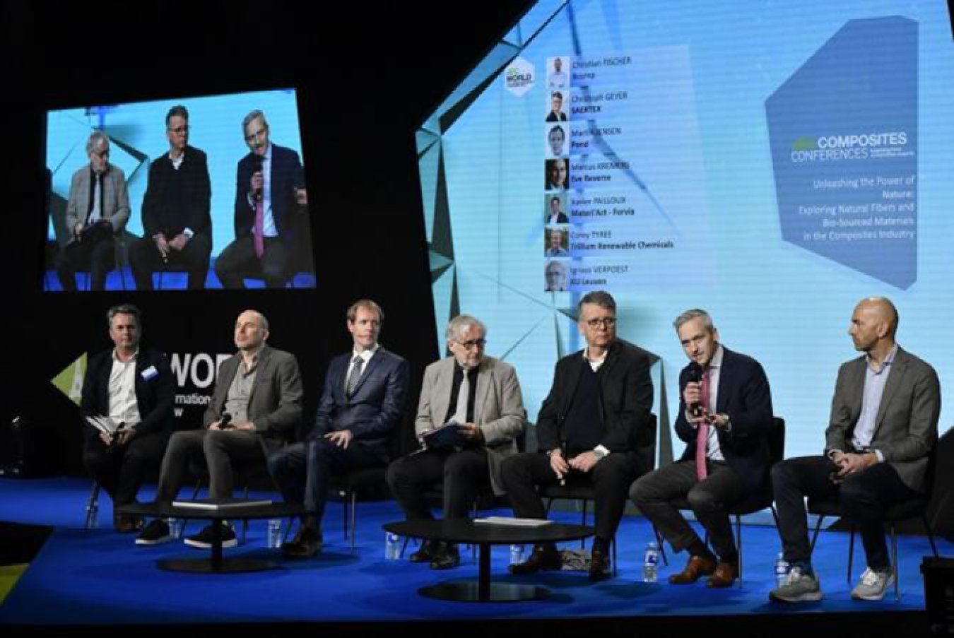 Speakers on panel at trade show