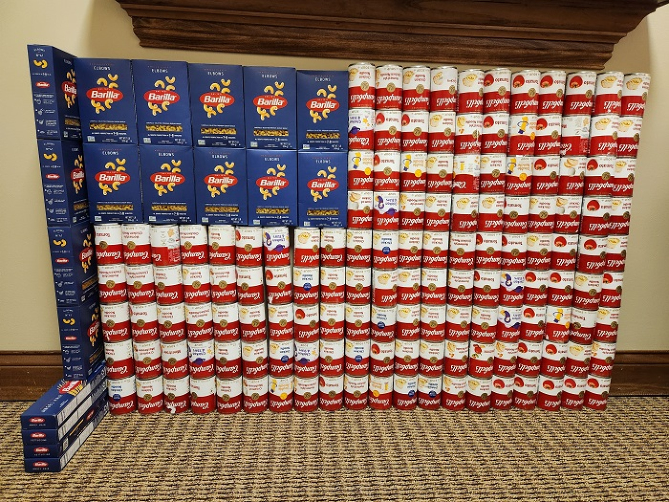 Canned and boxed food stacked into an American Flag