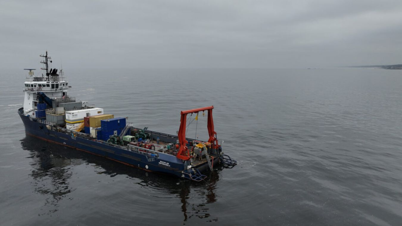 A photo of the Seacor Lee out at sea on a cloudy and gray overcast day.