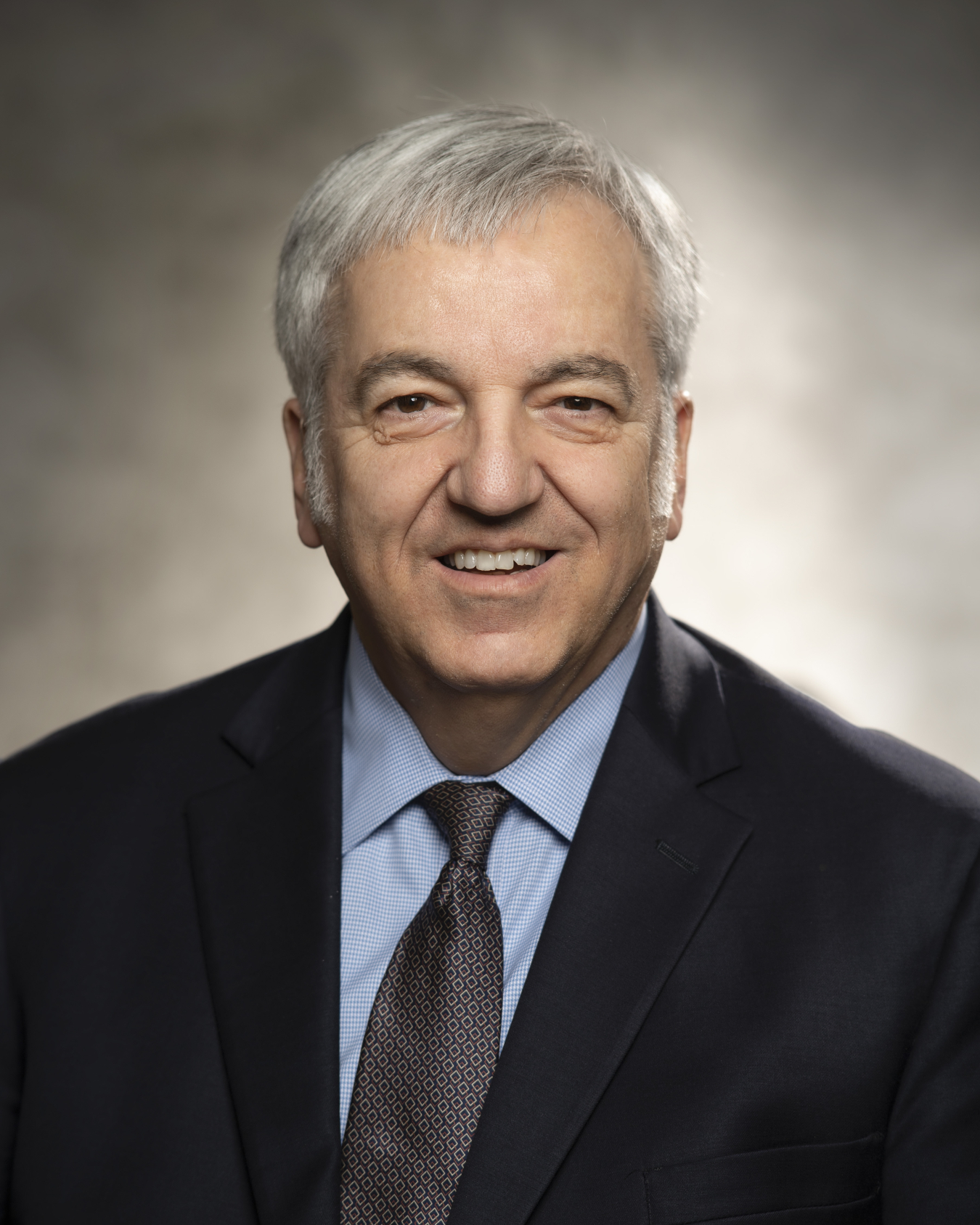 A man looks at the camera.