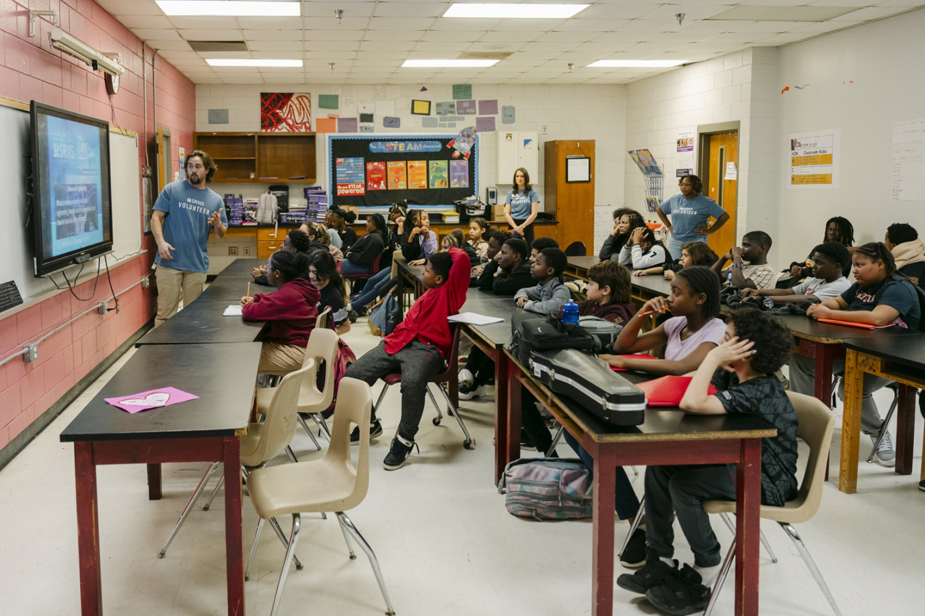 A class of students participating in engineering activities 