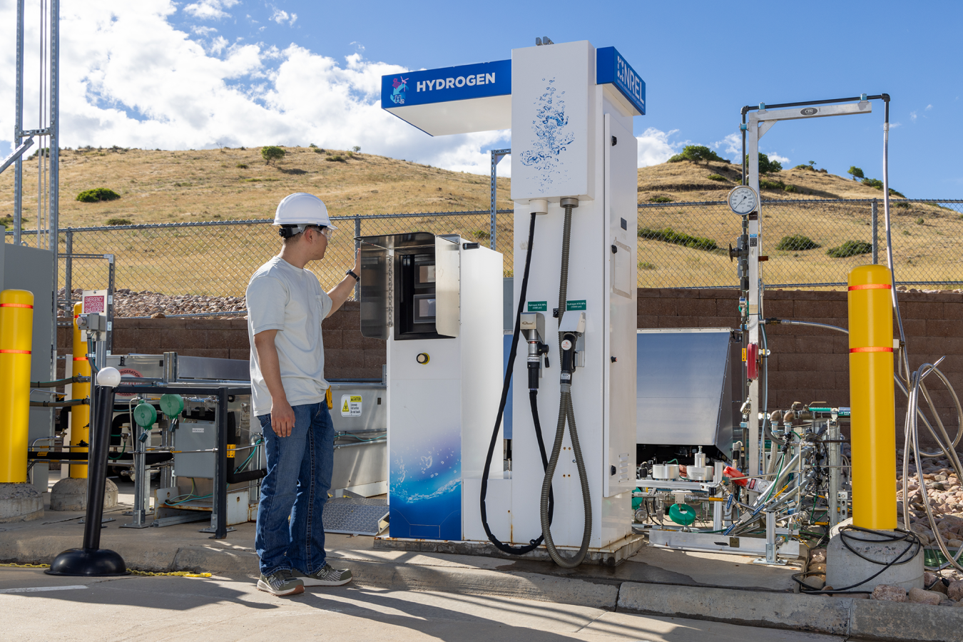 Intern monitoring the Hydrogen Refueling Dispenser at the Hydrogen Infrastructure Testing and Research Facility.