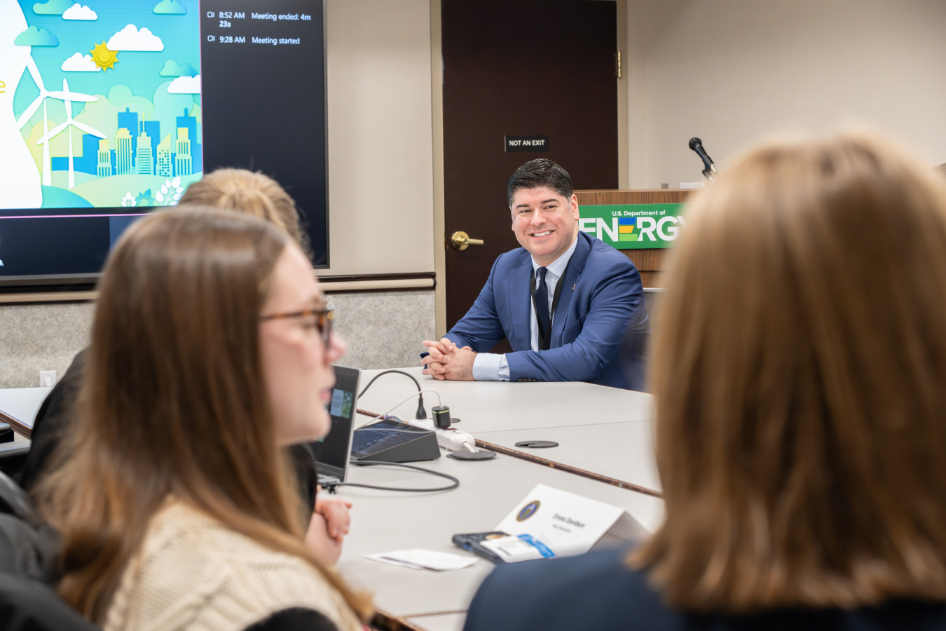 Director of the Office of State and Community Energy Programs, Eric Mahroum, smiles as he interacts with students during the 2025 National 4-H Conference