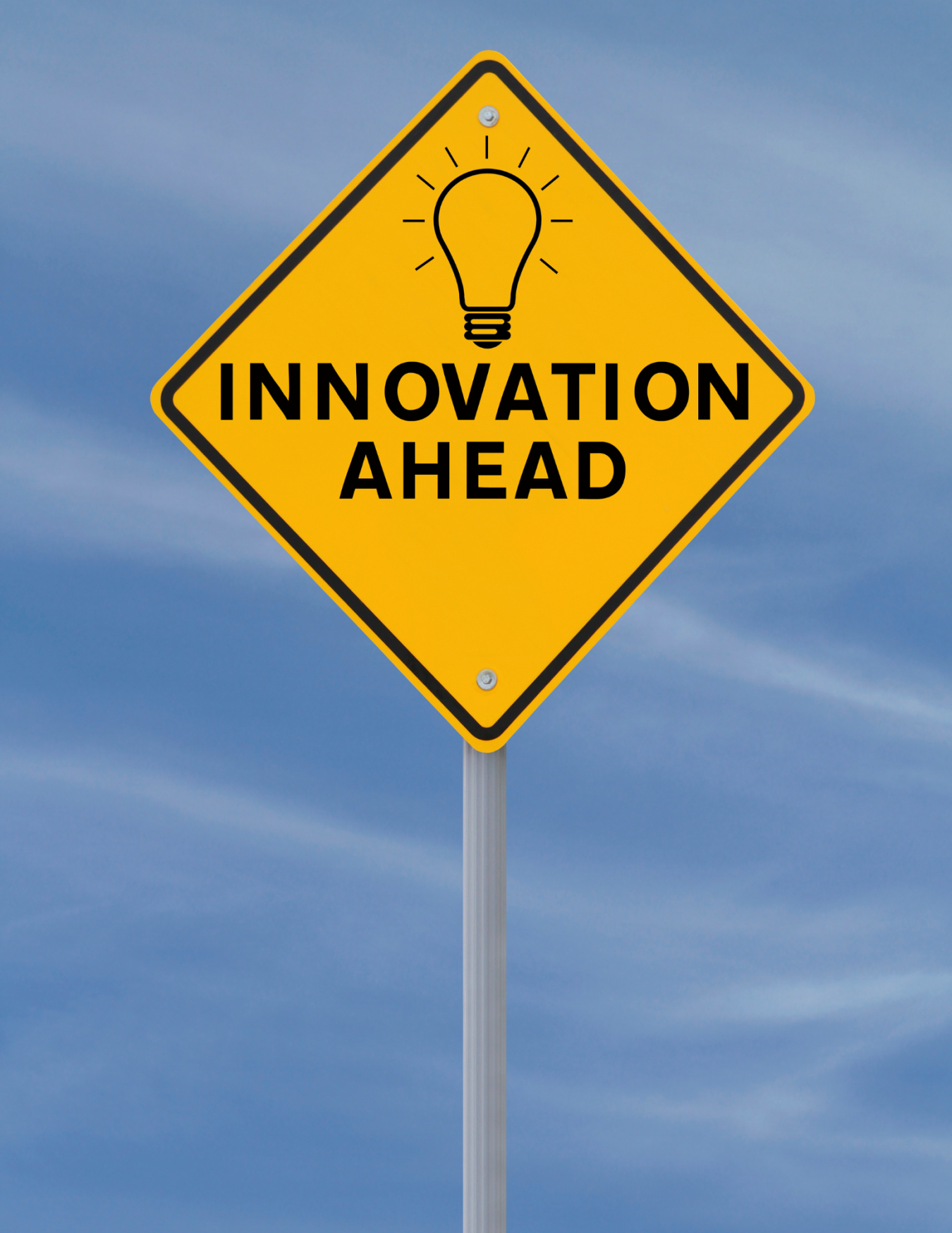 A picture of a road sign that reads, Innovation Ahead.